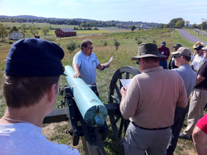 man and cannon